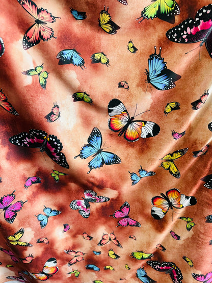 Butterfly design Multicolor print on great quality of poly spandex 2-way stretch 58/60” Sold by the YD. Ships worldwide from L.A CA