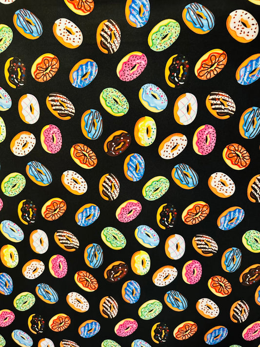 New donuts design Black multicolor print on great quality of nylon spandex 4way Stretch 58/60” Sold by the yd. Ships worldwide from L.A