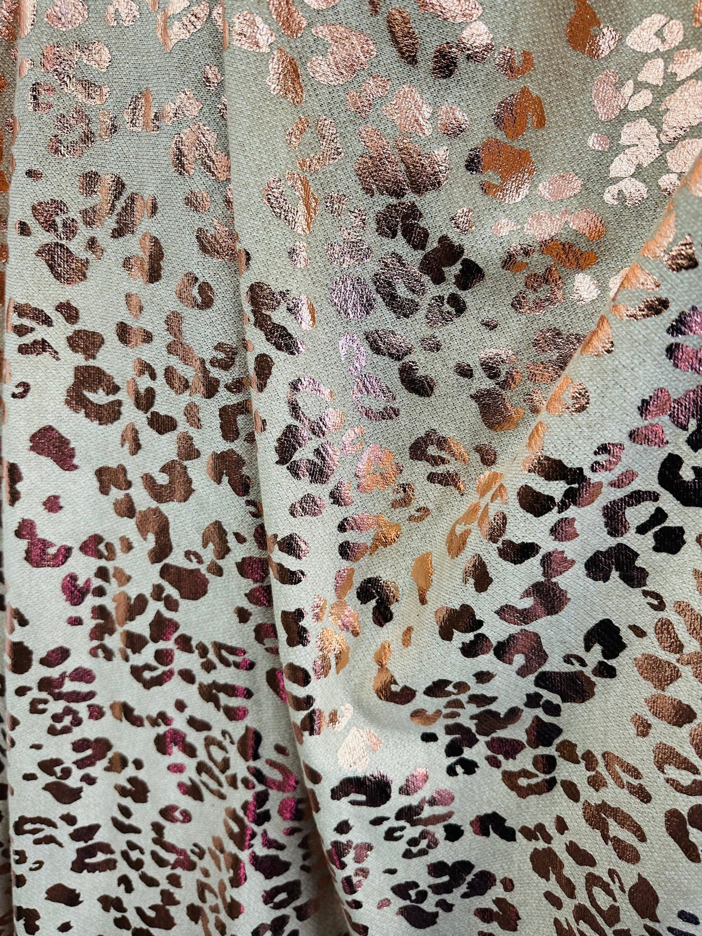 New French Terry fabric with foil leopard design high quality 2-way stretch 58/60” Sold by the YD. Ships worldwide from L.A CA