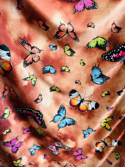 Butterfly design Multicolor print on great quality of poly spandex 2-way stretch 58/60” Sold by the YD. Ships worldwide from L.A CA