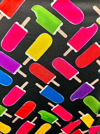 Vivid Ice Cream design black/Multicolor print on great quality of nylon spandex 4-way stretch 58/60” Sold by the YD.