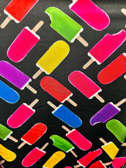 Vivid Ice Cream design black/Multicolor print on great quality of nylon spandex 4-way stretch 58/60” Sold by the YD.