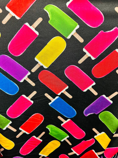 Vivid Ice Cream design black/Multicolor print on great quality of nylon spandex 4-way stretch 58/60” Sold by the YD.