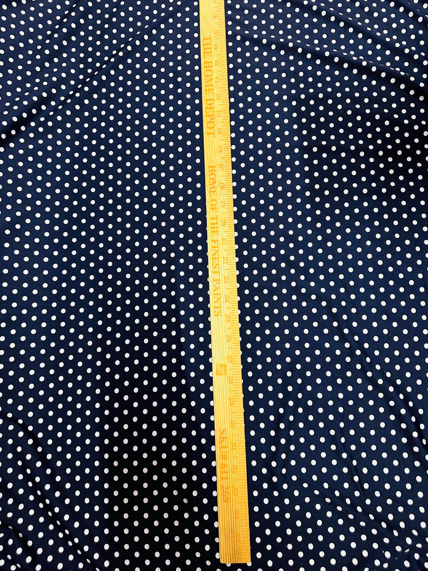 Small dots navy/white print on great quality of nylon spandex 4-way stretch 58/60” Sold by the YD. Ships worldwide from L.A