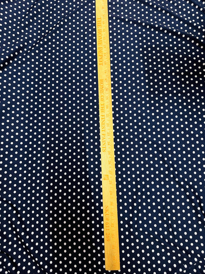 Small dots navy/white print on great quality of nylon spandex 4-way stretch 58/60” Sold by the YD. Ships worldwide from L.A