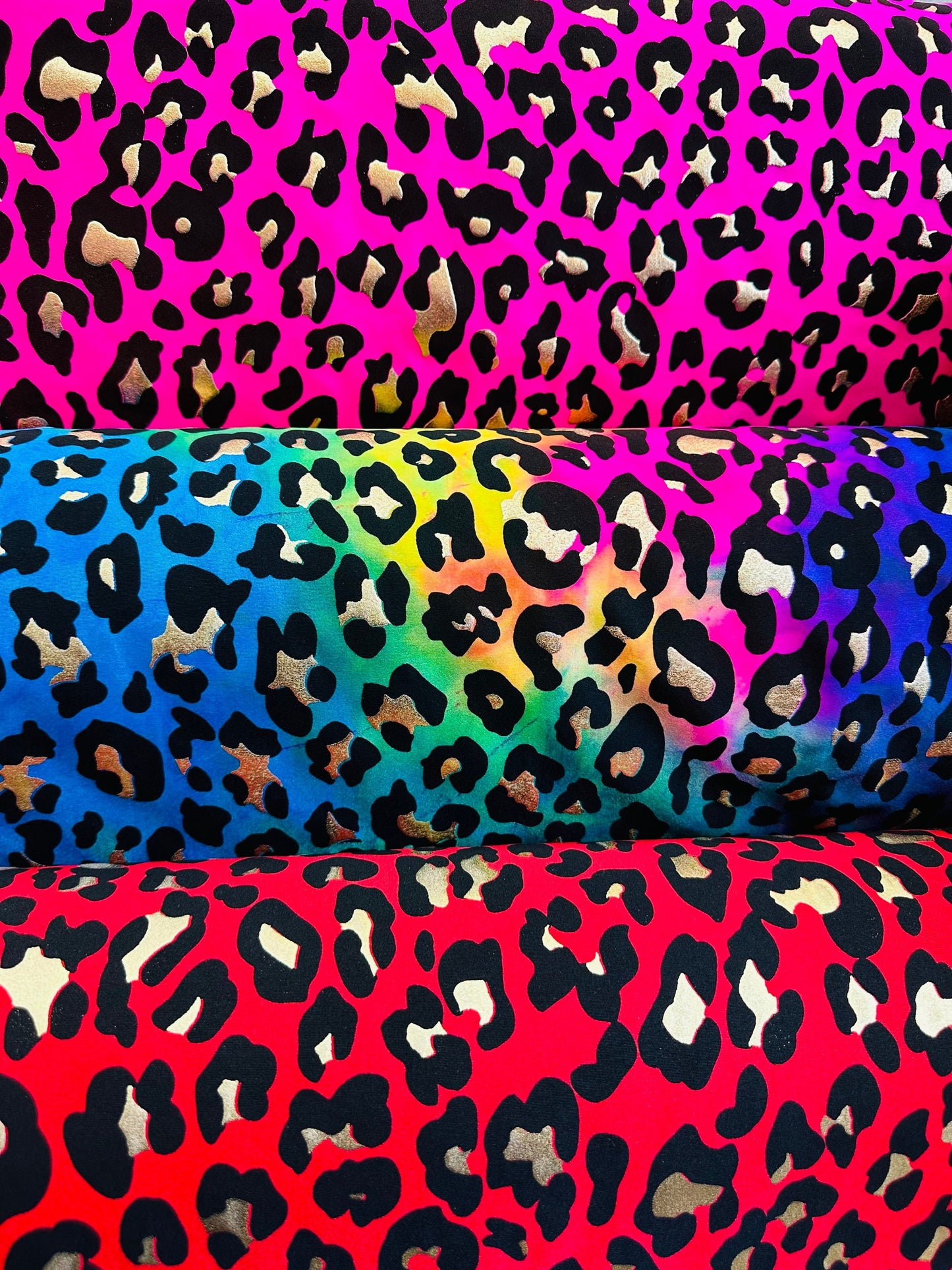 Exotic Leopard design metallic tie dye nylon spandex 4-way stretch 58/60” Sold by the YD. Ships worldwide from Los Angeles California USA