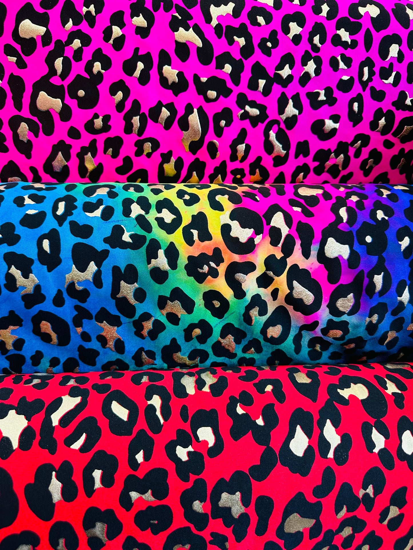 Exotic Leopard design metallic tie dye nylon spandex 4-way stretch 58/60” Sold by the YD. Ships worldwide from Los Angeles California USA