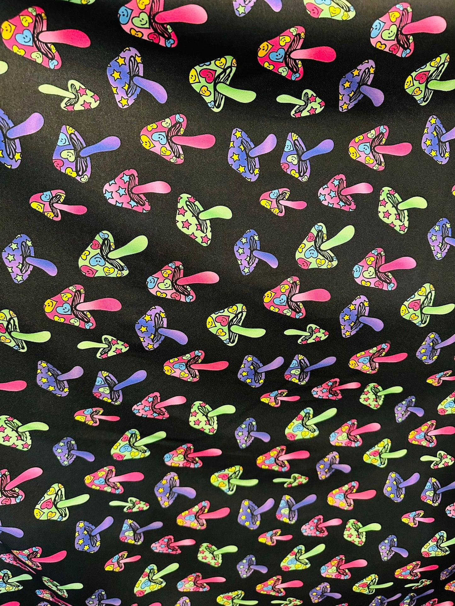 Mushrooms design with neon rainbow colors print on poly jumbo spandex 4-way stretch 58/60”