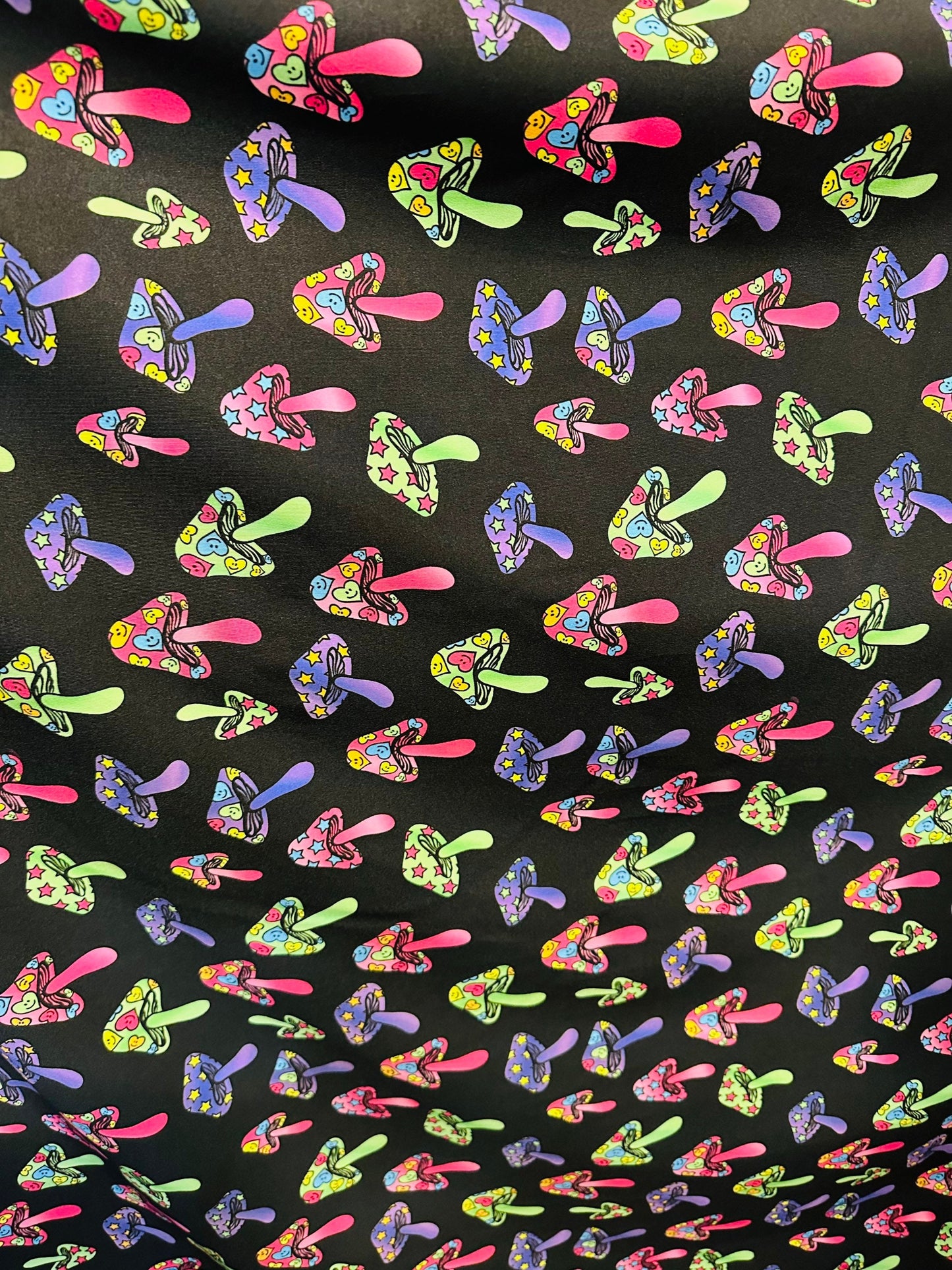 Mushrooms design with neon rainbow colors print on poly jumbo spandex 4-way stretch 58/60”