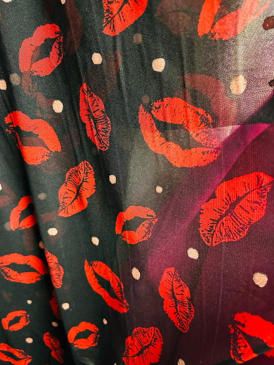 Lips design print on power mesh 4-way stretch 58/60” Sold by the YD. Ships worldwide from Los Angeles California USA