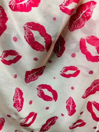 Lips design print on power mesh 4-way stretch 58/60” Sold by the YD. Ships worldwide from Los Angeles California USA