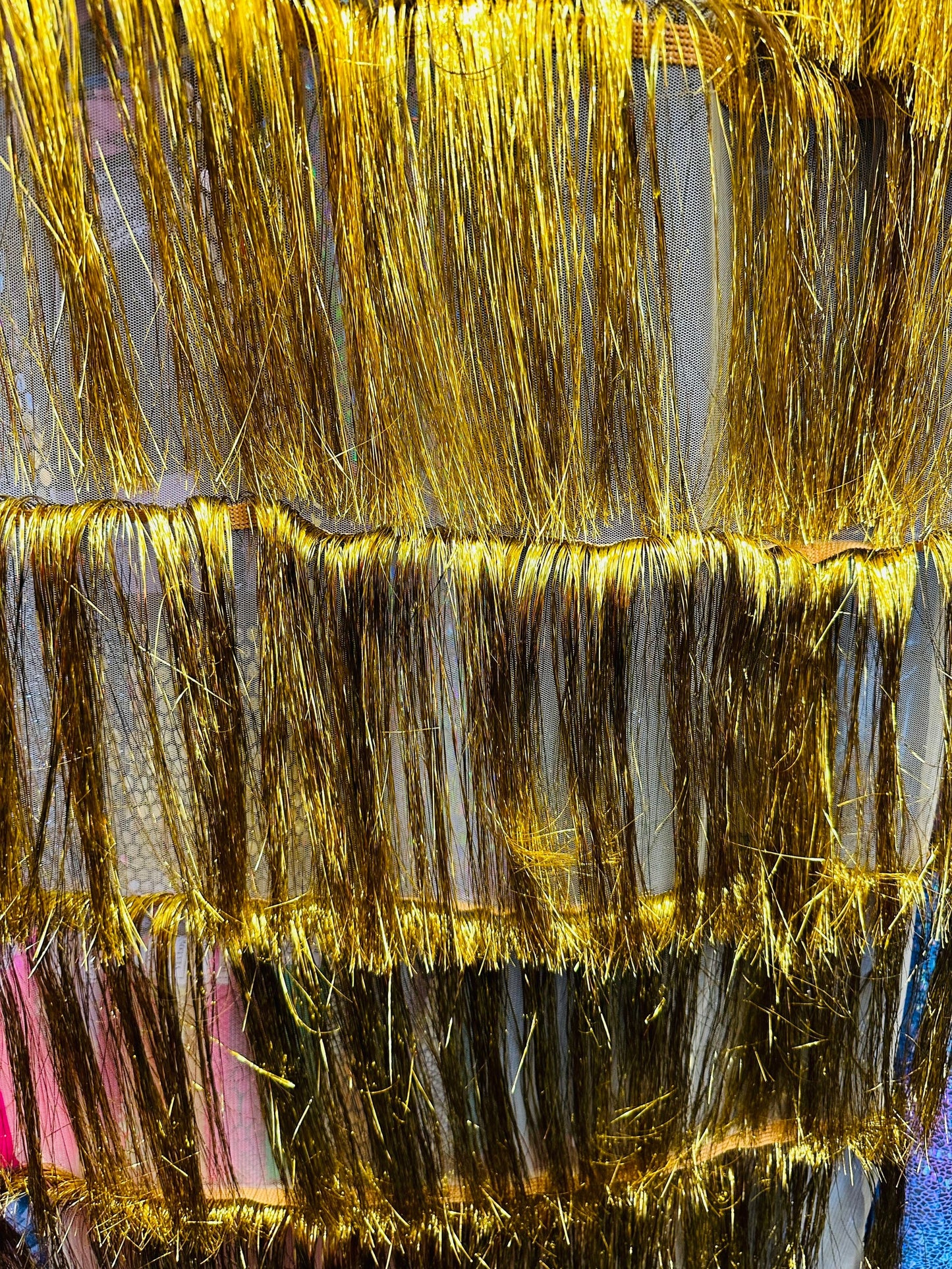 Fancy multi luxury tinsel fringe design metallic long hair embroidered on stretch mesh 2-way stretch 58/60” Sold by the YD. Ships Worldwide