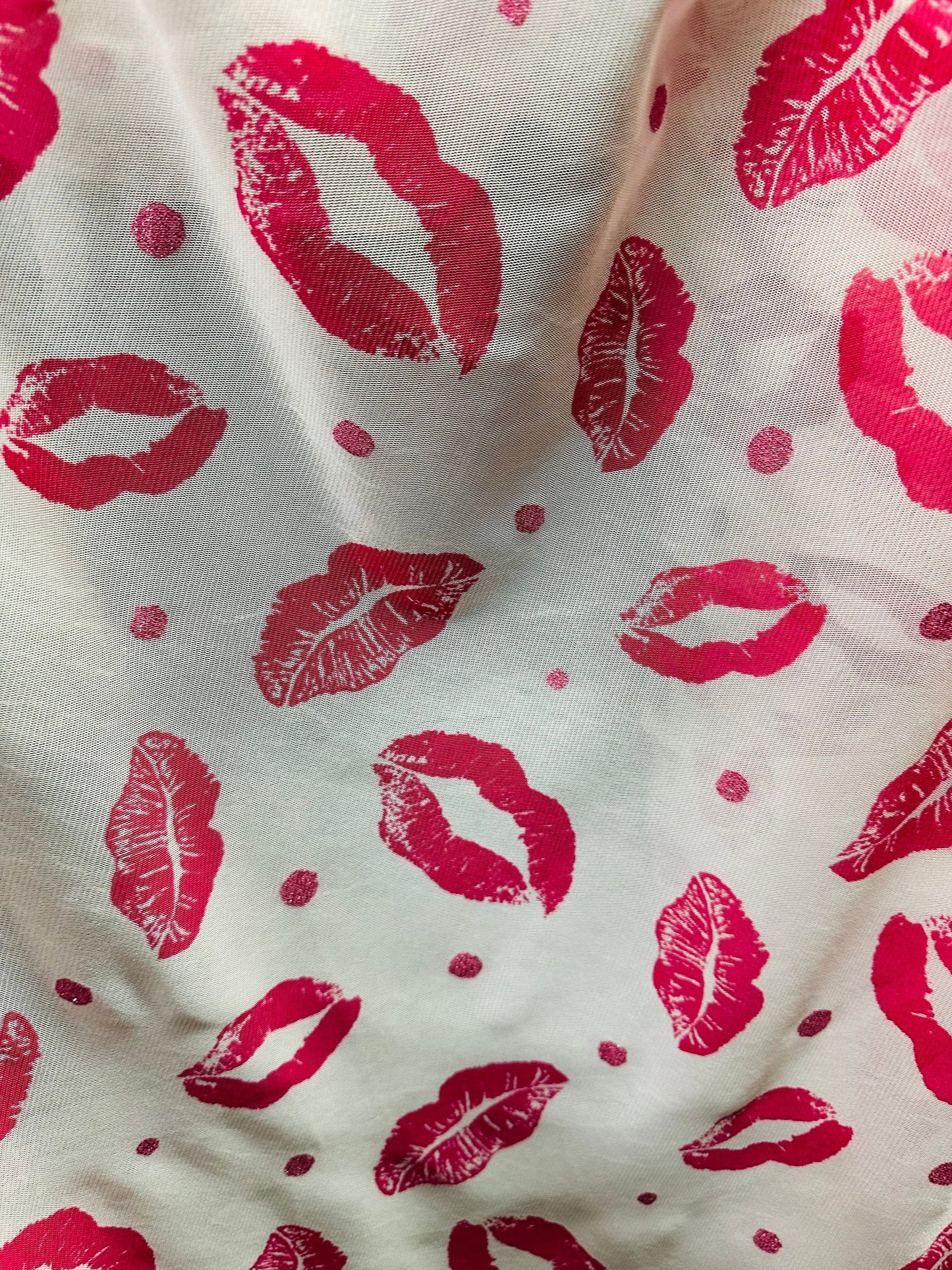 Lips design print on power mesh 4-way stretch 58/60” Sold by the YD. Ships worldwide from Los Angeles California USA