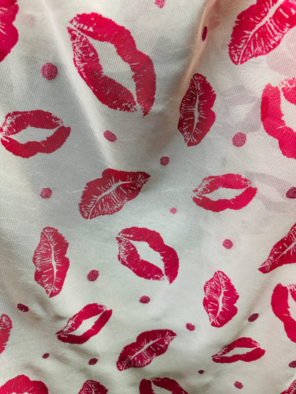 Lips design print on power mesh 4-way stretch 58/60” Sold by the YD. Ships worldwide from Los Angeles California USA