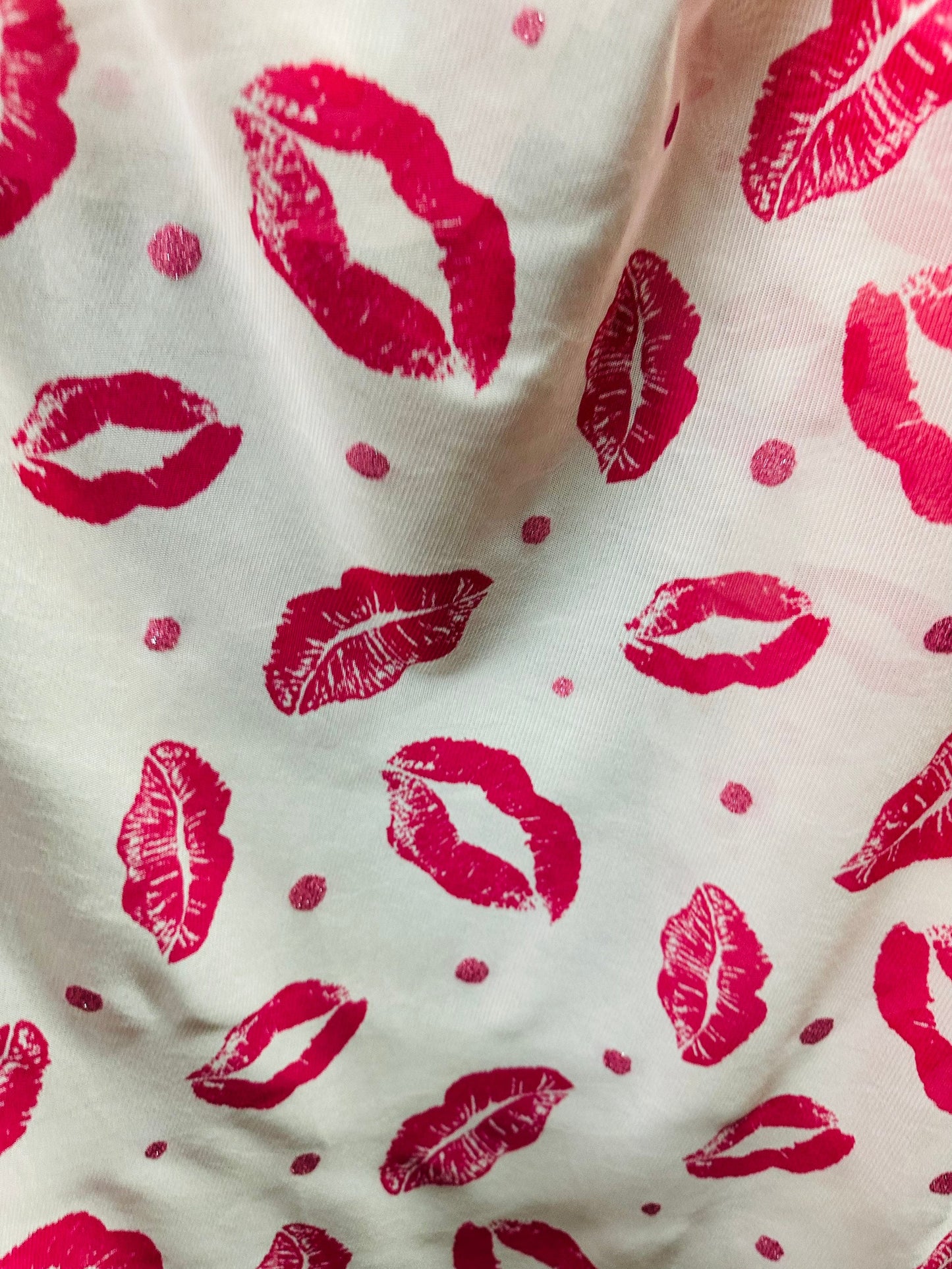 Lips design print on power mesh 4-way stretch 58/60” Sold by the YD. Ships worldwide from Los Angeles California USA