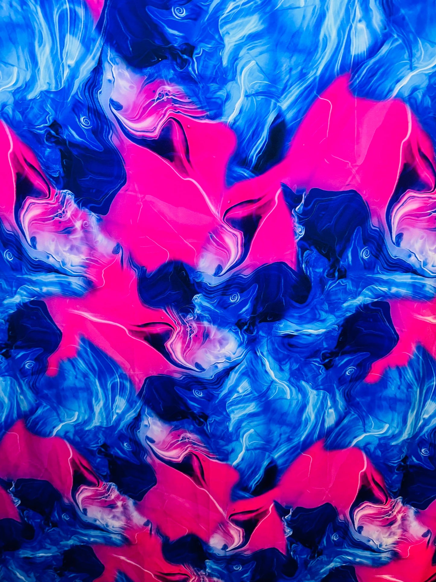 New Liquid Abstract lava design Sapphire/pink print on best quality of nylon spandex 4-way stretch 58/60” Sold by the YD.