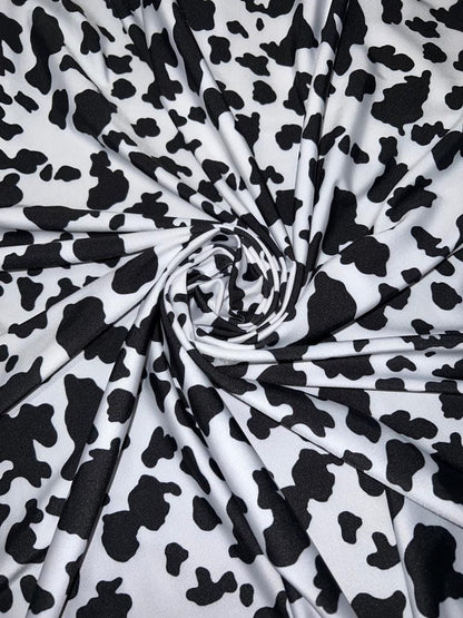 Cow Exotic design print on best quality of nylon spandex 4-way stretch 58/60” Sold by the YD.