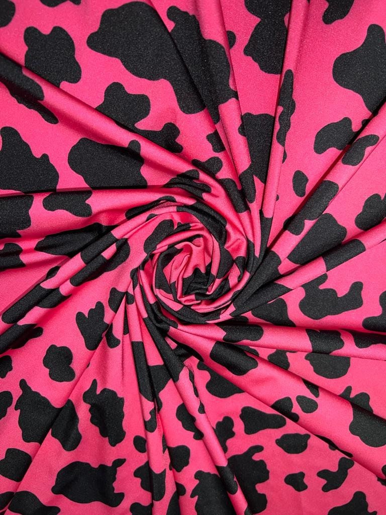 Cow Exotic design print on best quality of nylon spandex 4-way stretch 58/60” Sold by the YD.