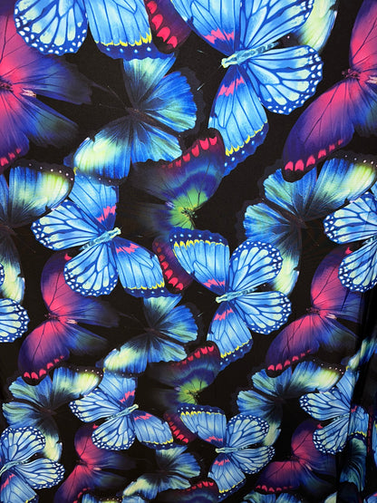 New Vivid Butterfly design print on great quality of Poly spandex 4-way stretch 58/60” Sold by the YD.