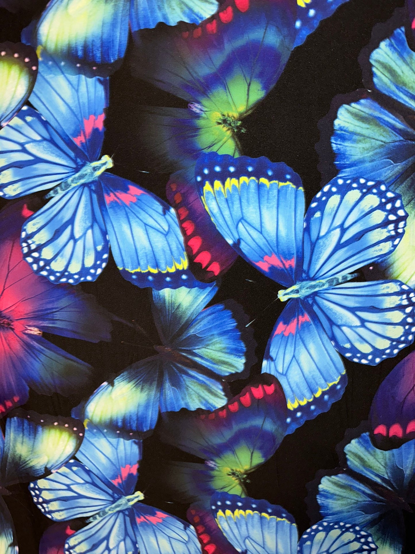 New Vivid Butterfly design print on great quality of Poly spandex 4-way stretch 58/60” Sold by the YD.