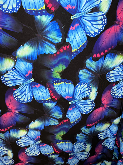 New Vivid Butterfly design print on great quality of Poly spandex 4-way stretch 58/60” Sold by the YD.