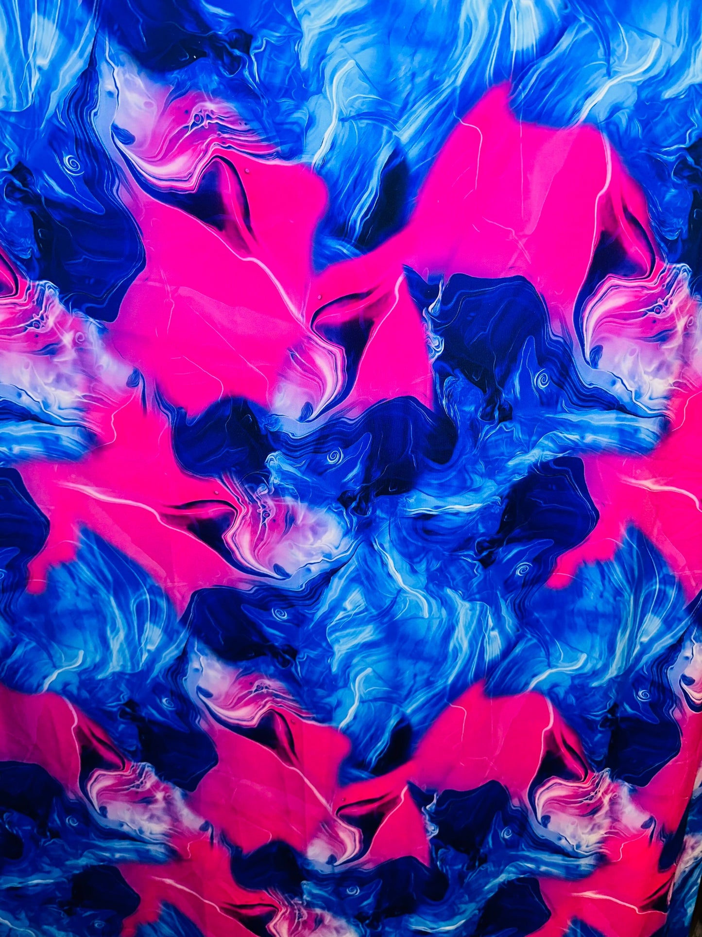 New Liquid Abstract lava design Sapphire/pink print on best quality of nylon spandex 4-way stretch 58/60” Sold by the YD.