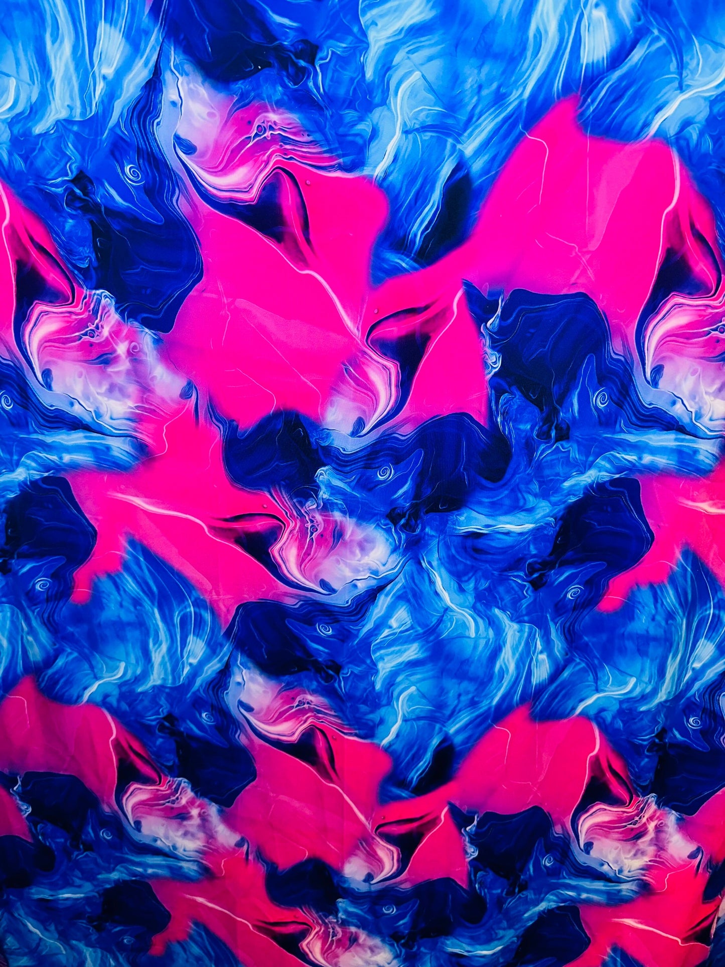 New Liquid Abstract lava design Sapphire/pink print on best quality of nylon spandex 4-way stretch 58/60” Sold by the YD.