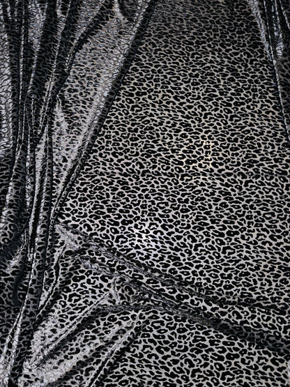 New Exotic cheetah design luxury black burnout stretch velvet 4-way stretch 58/60” Sold by the YD. High quality fabric In the market.