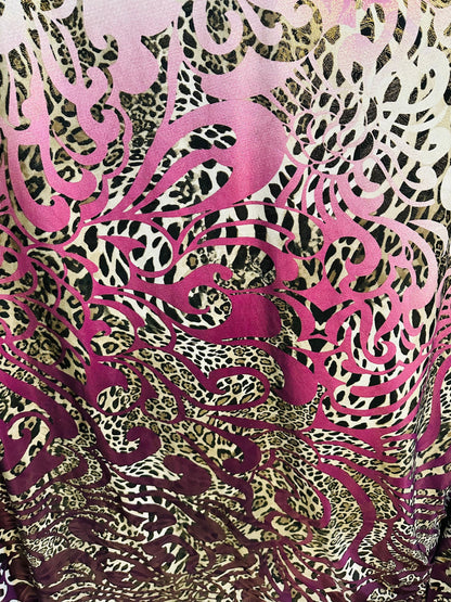 New swirl design with exotic animal print with foil  on poly spandex 2-way stretch 58/60” Medium weight Sold by the YD. Ships Worldwide