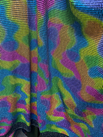 New Lava abstract design with neon colors it glows under black light metallic spandex with Geometric sequins all over 2-way stretch