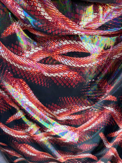 Anaconda Amazon design exotic snake print on great quality of metallic iridescent nylon spandex 4-way stretch 58/60” Sold by the YD.