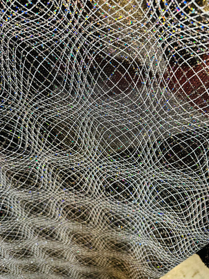 New spiderweb design on metallic poly spandex with glitter 4-way stretch 58/60” Sold by the YD. Ships worldwide from L.A