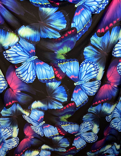 New Vivid Butterfly design print on great quality of Poly spandex 4-way stretch 58/60” Sold by the YD.