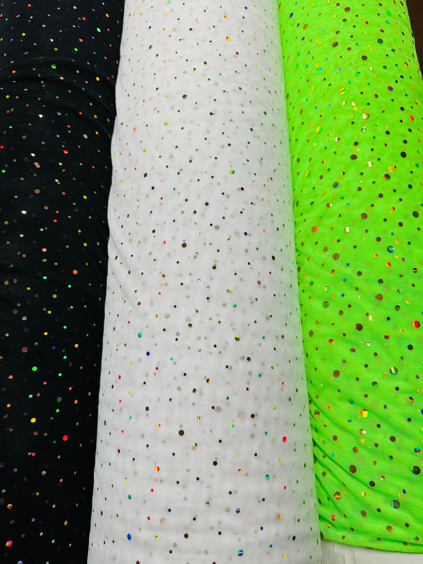 Luxury stretch power mesh with Lacer hologram sequins all over 4-way stretch 58/60” Sold by the YD.