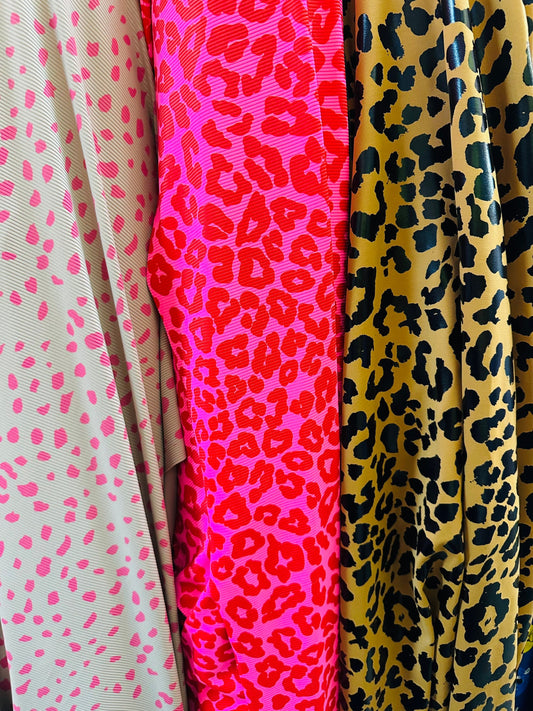 Exotic multi animal print on spandex ribbed and metallic nylon spandex 4-way stretch 58/60” Sold by the YD.