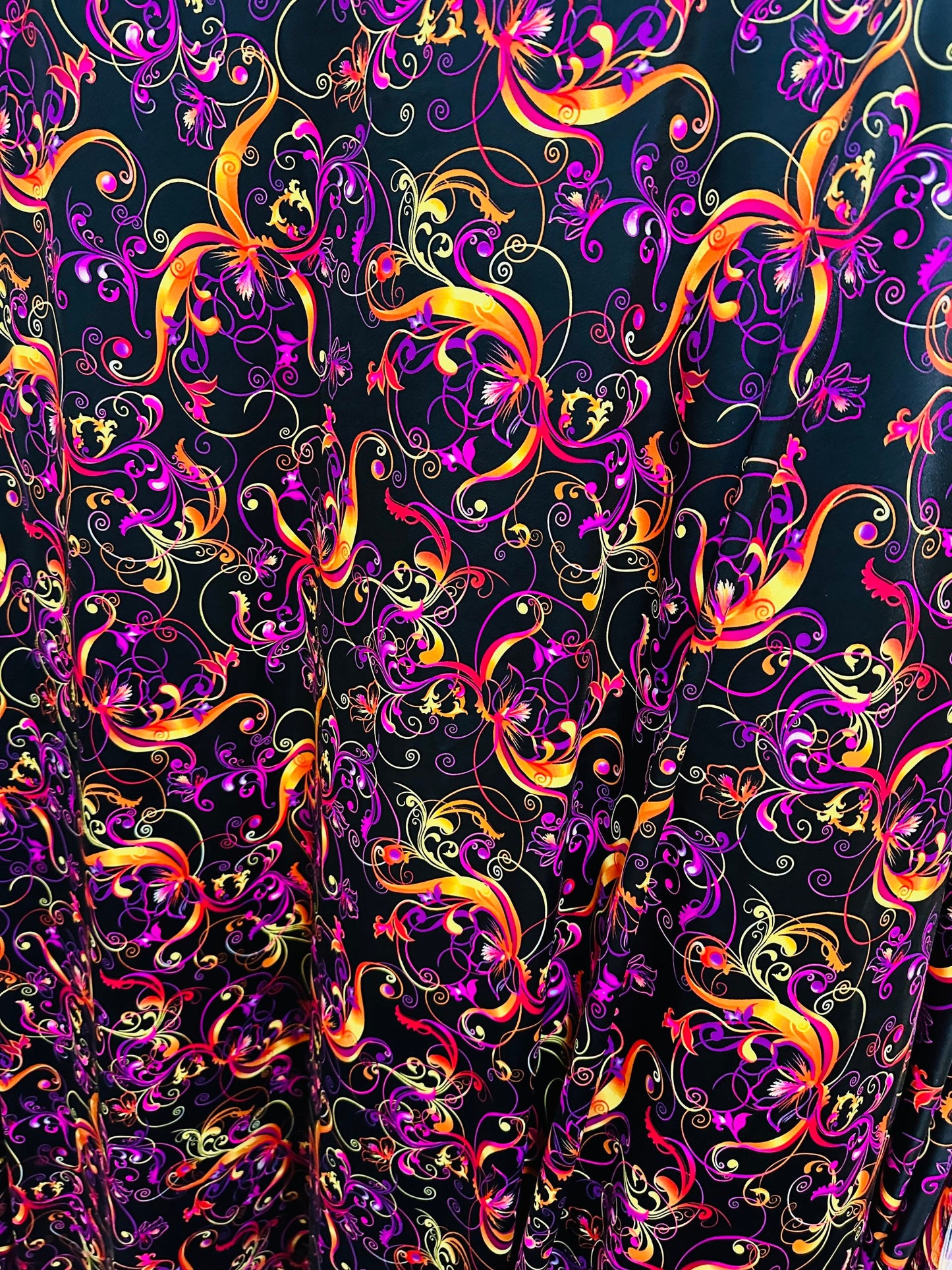 New Magic Flourish design Black/Multicolor Best quality of nylon spandex  4-way stretch 58/60” high quality spandex Sold by the YD.