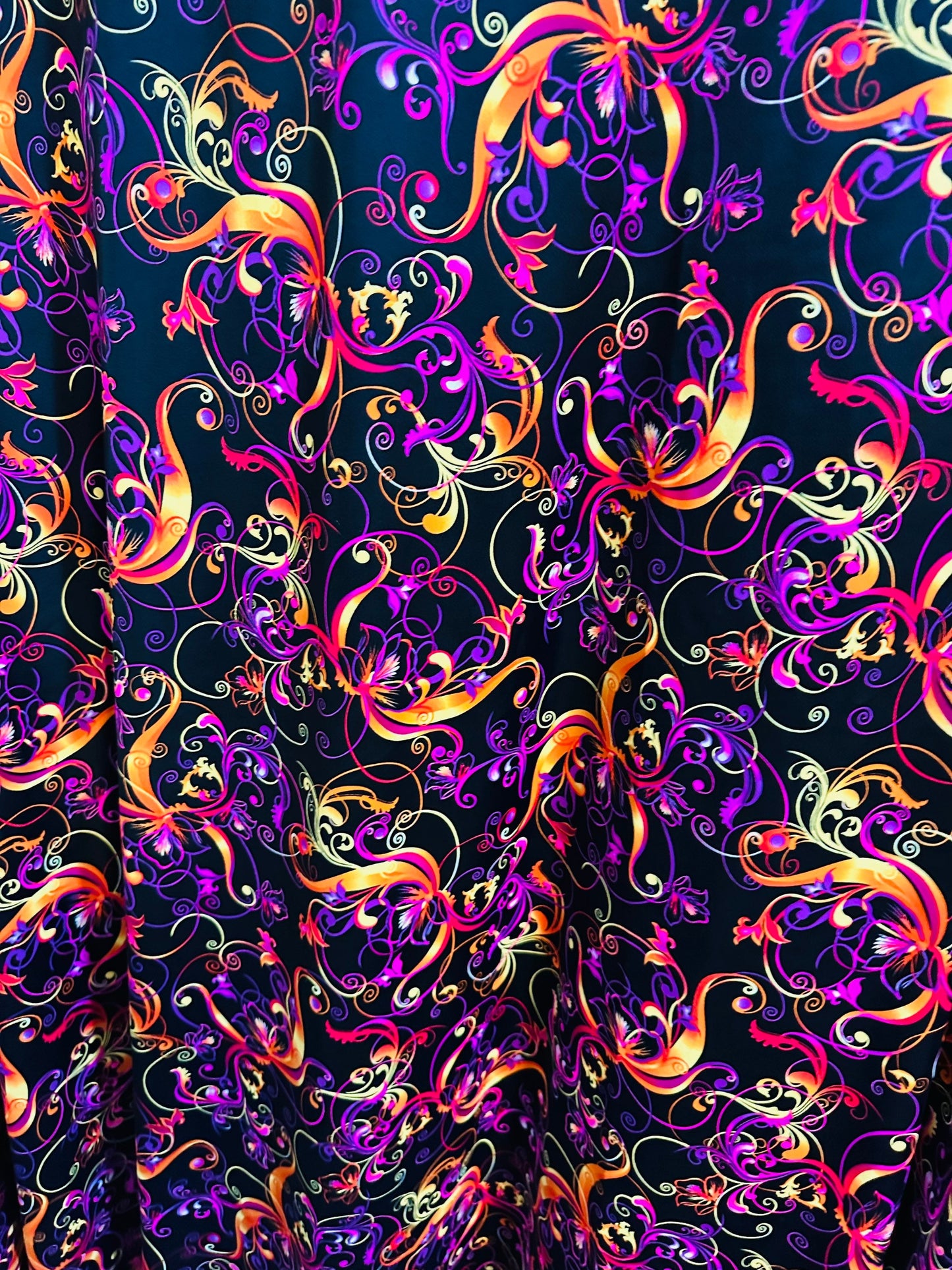 New Magic Flourish design Black/Multicolor Best quality of nylon spandex  4-way stretch 58/60” high quality spandex Sold by the YD.