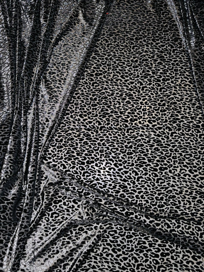 New Exotic cheetah design luxury black burnout stretch velvet 4-way stretch 58/60” Sold by the YD. High quality fabric In the market.