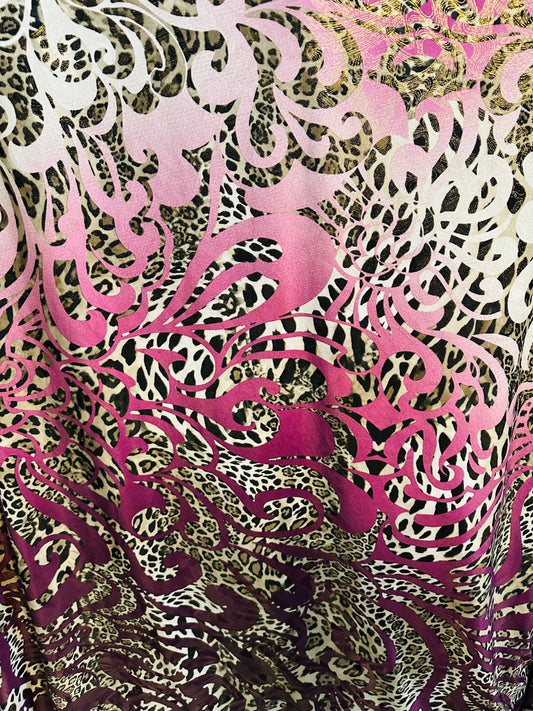 New swirl design with exotic animal print with foil  on poly spandex 2-way stretch 58/60” Medium weight Sold by the YD. Ships Worldwide