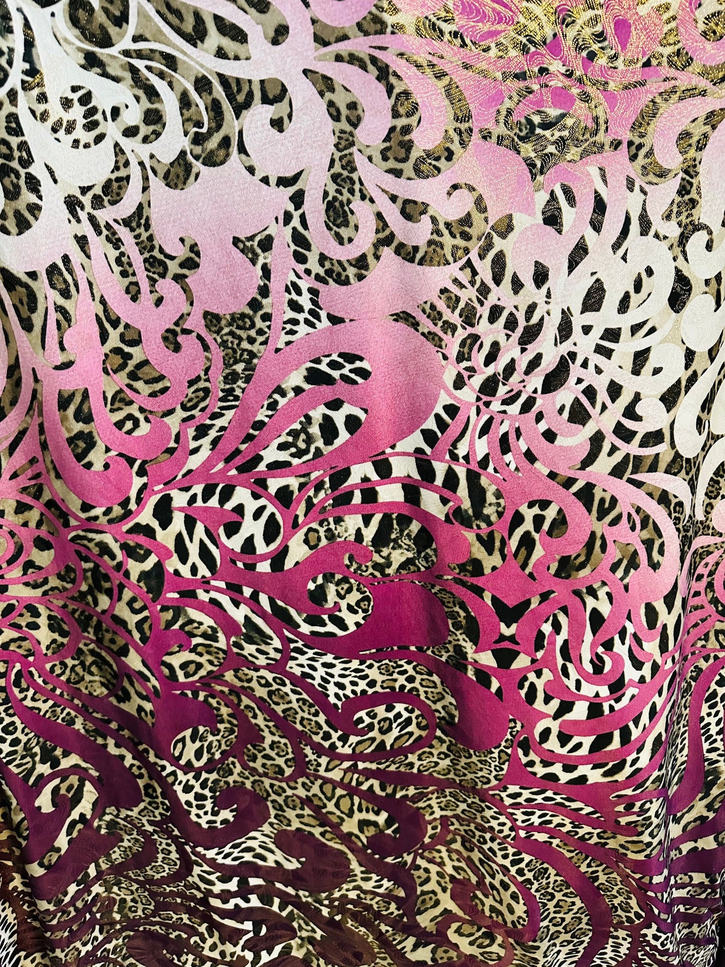 New swirl design with exotic animal print with foil  on poly spandex 2-way stretch 58/60” Medium weight Sold by the YD. Ships Worldwide