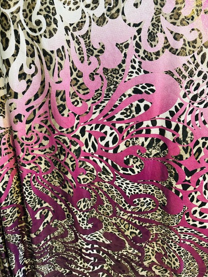 New swirl design with exotic animal print with foil  on poly spandex 2-way stretch 58/60” Medium weight Sold by the YD. Ships Worldwide