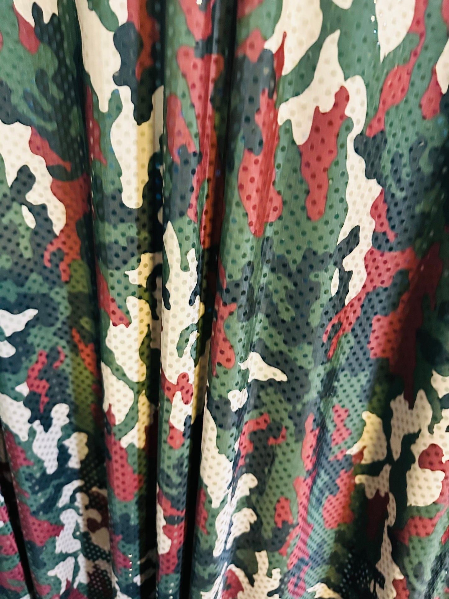 Camouflage design Army color print on great quality of poly spandex 2-way stretch with clear sequins 58/60” Sold by the YD.