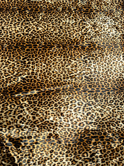 Wild Cheetah design Gold/Brown print on great quality of stretch velvet 4-way stretch 58/60” Sold by the YD.