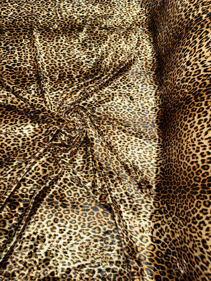 Wild Cheetah design Gold/Brown print on great quality of stretch velvet 4-way stretch 58/60” Sold by the YD.