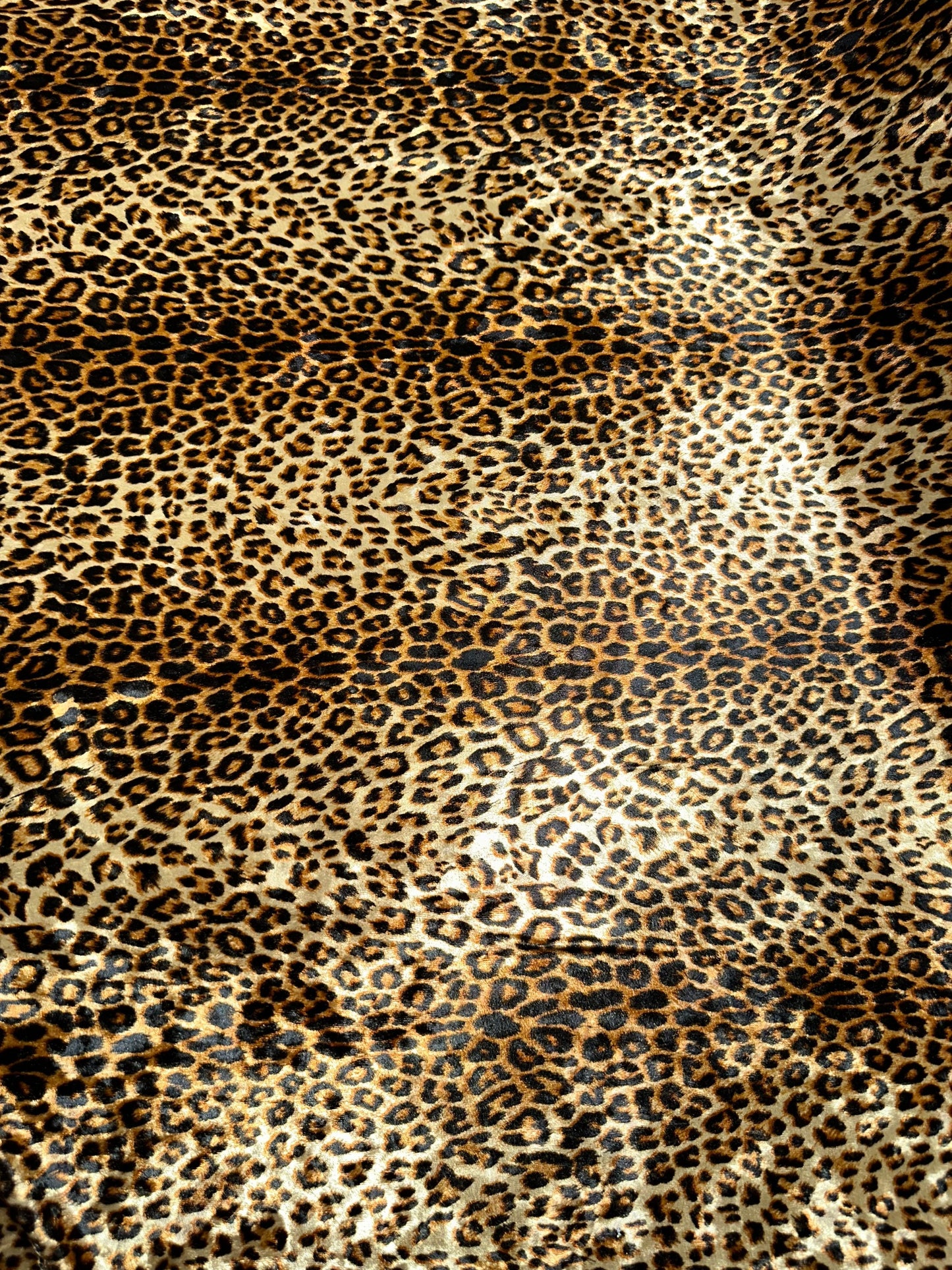 Wild Cheetah design Gold/Brown print on great quality of stretch velvet 4-way stretch 58/60” Sold by the YD.