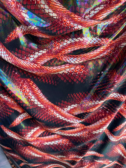 Anaconda Amazon design exotic snake print on great quality of metallic iridescent nylon spandex 4-way stretch 58/60” Sold by the YD.