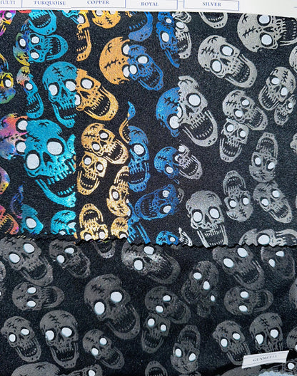 Luxury Laughing skulls design metallic nylon spandex with foil 4-way stretch 58/60” Sold by the YD. Ships worldwide from L.A