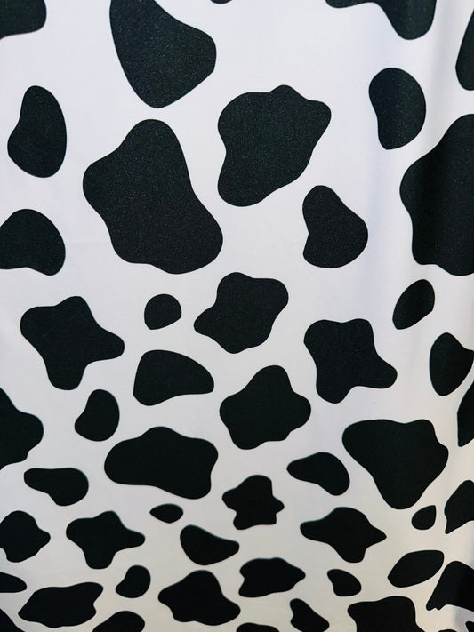 New Cow design print on great quality of poly spandex 4-way stretch 58/60” Sold by the YD. Ships worldwide from Los Angeles California USA