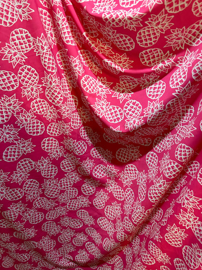 Tropical Pineapple design pink/white print on best quality of nylon spandex 4-way stretch 58/60” Sold by the YD.