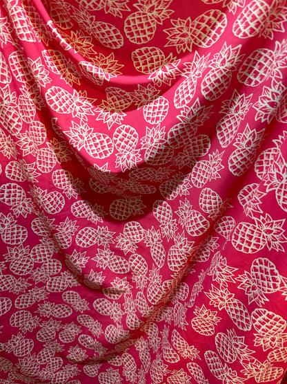 Tropical Pineapple design pink/white print on best quality of nylon spandex 4-way stretch 58/60” Sold by the YD.